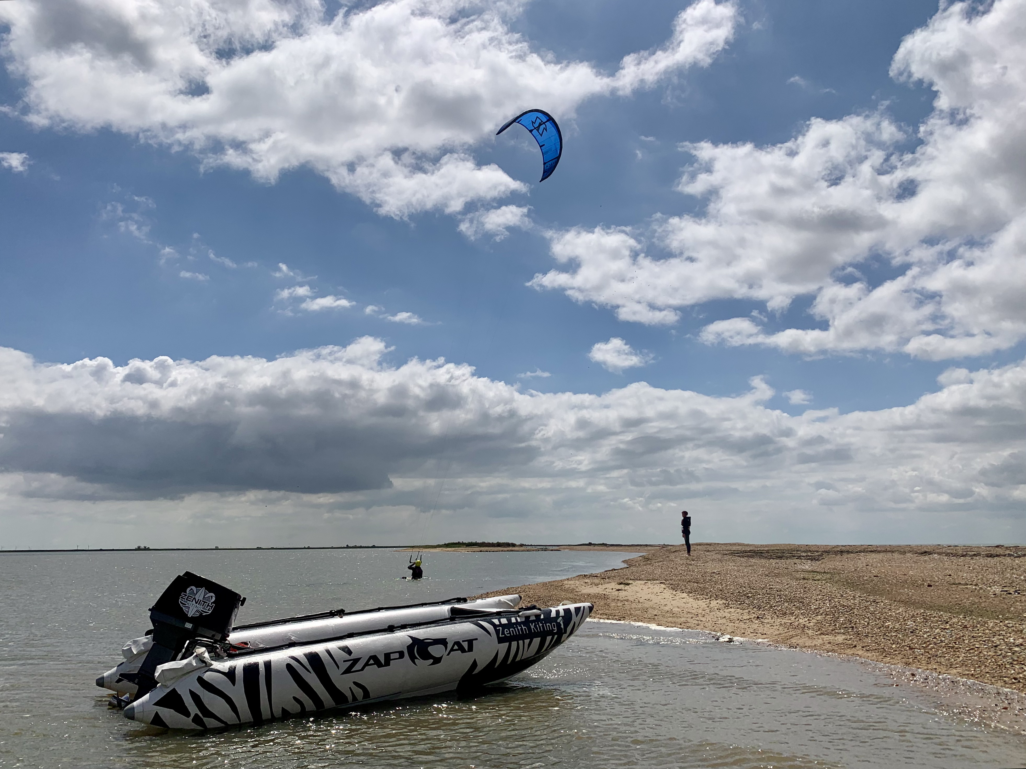 Zenith Kiting Zapcat safety boat beached on a sandbar