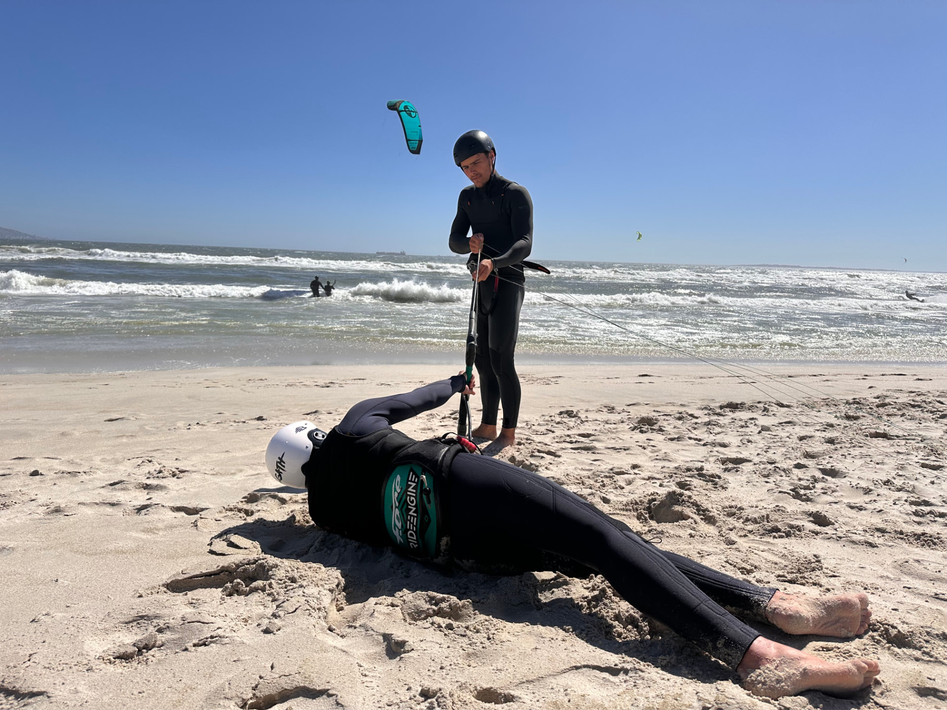 Instructor demonstrating a self-rescue technique under supervision