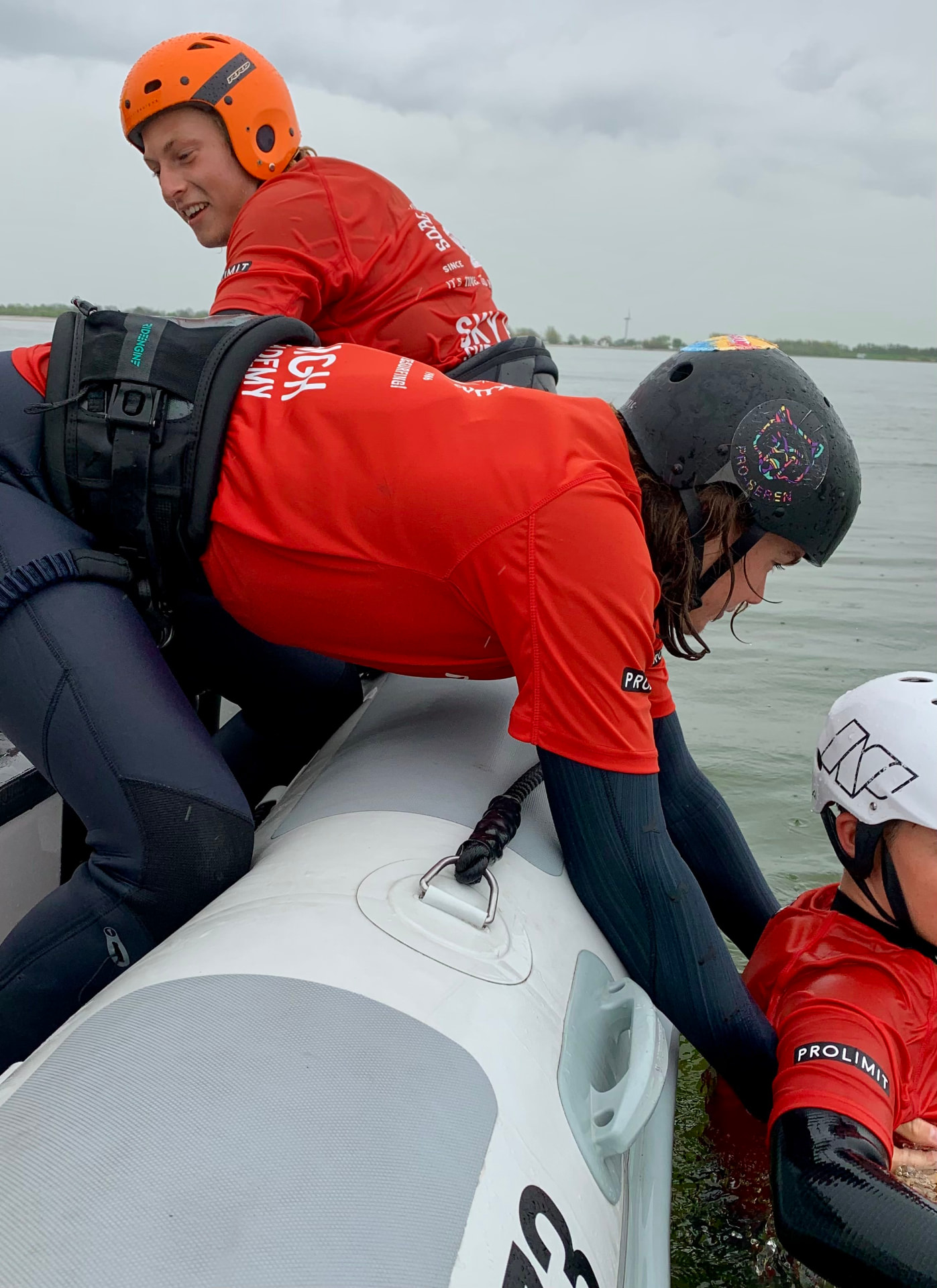 Water rescue practice from the safety boat during instructor training