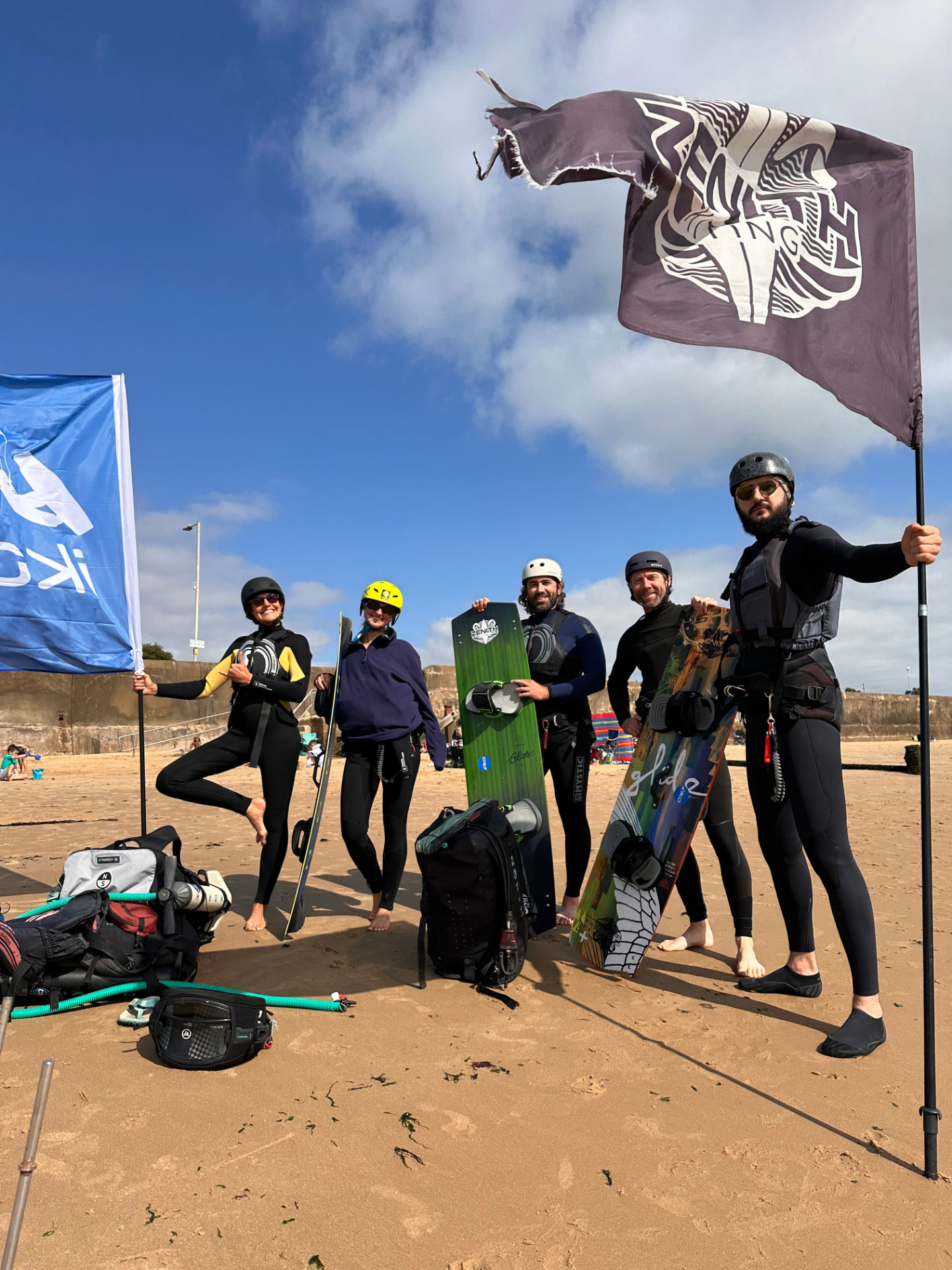 Zenith Kiting course group on the beach in Essex with the Zenith flag
