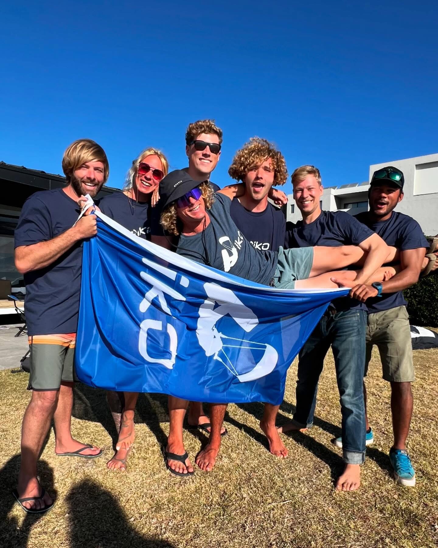 Qualified IKO instructors celebrating with the IKO flag