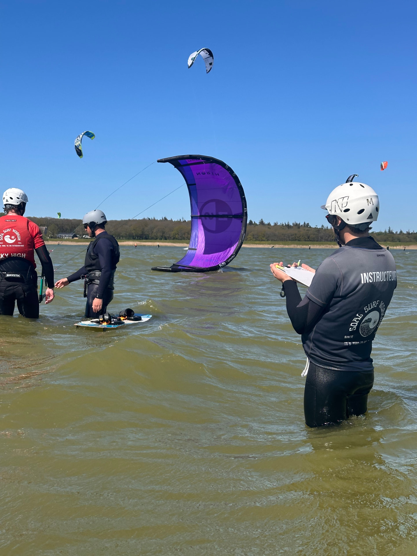 IKO Examiner assessing a candidate teaching in the water